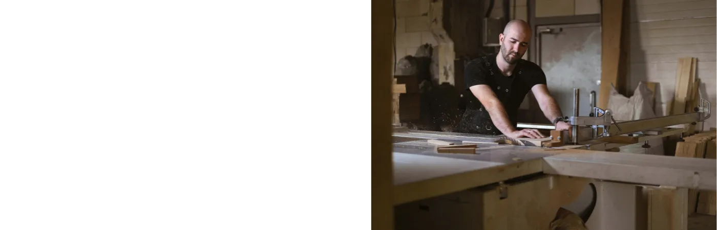 Luxzagap woodworking workshop in Austin Texas with artisan craftsman working on handmade wooden furniture